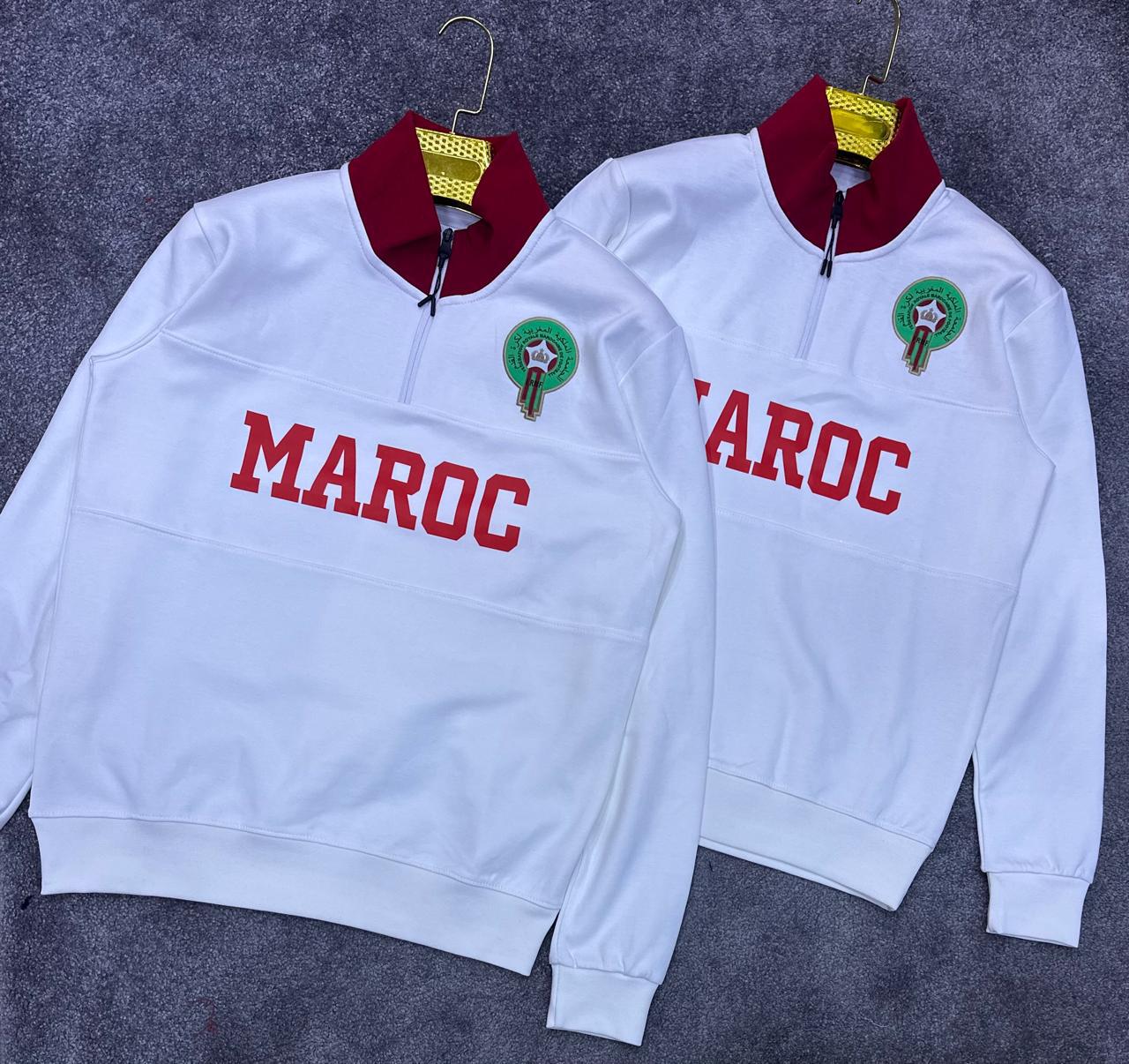 قمصان رياضية بألوان مميزة وشعار المنتخب المغربي: تصاميم تجمع بين الأناقة والدعم الرياضي