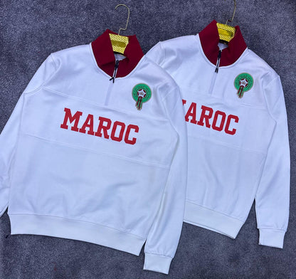 قمصان رياضية بألوان مميزة وشعار المنتخب المغربي: تصاميم تجمع بين الأناقة والدعم الرياضي